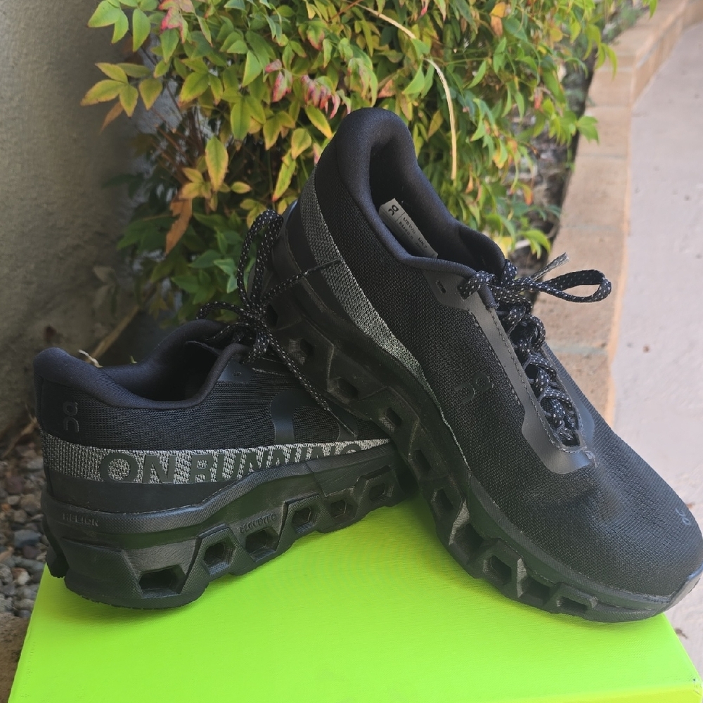 On Running Black and Gray Athletic Shoes